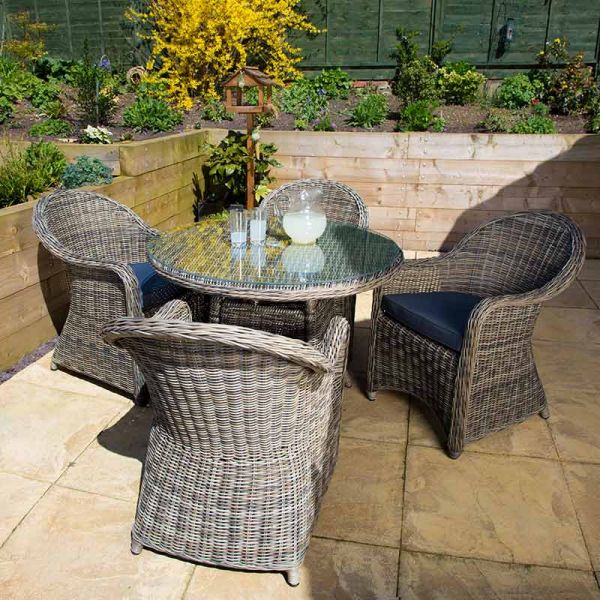 Regent Rattan 4 Person Round Glass Table and 4 Arm Chairs Set - Luxury Outdoor Range - Durable Brown Weave - Dark Grey Cushions Included