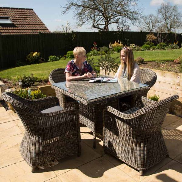 Regent Rattan Square Glass Table with 4 Arm Chairs Set - Luxury Outdoor Range - Durable Brown Weave - Dark Grey Cushions Included